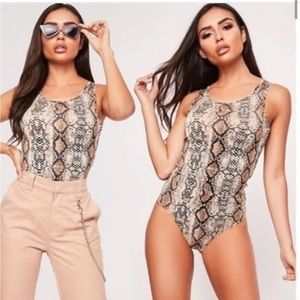 South boutique snake skin print body suit NWT